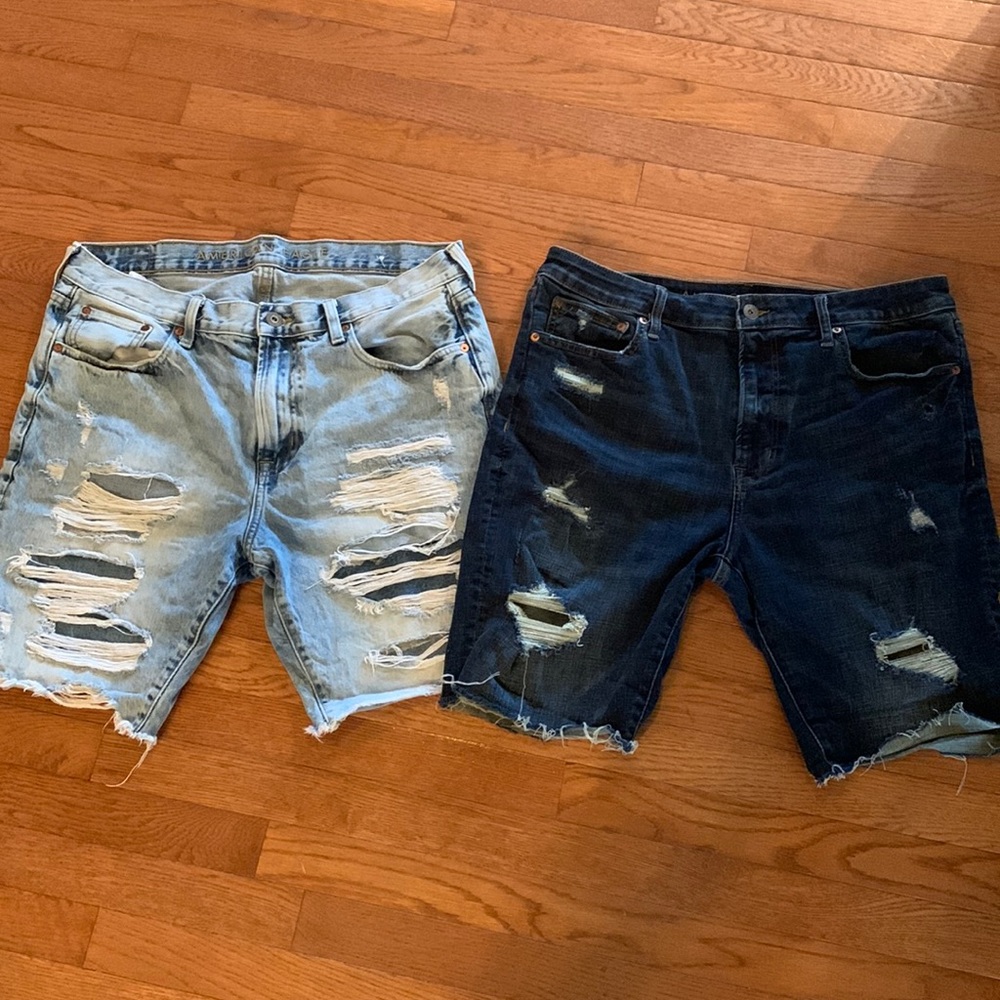 Two pairs of mens American eagle jean shorts.